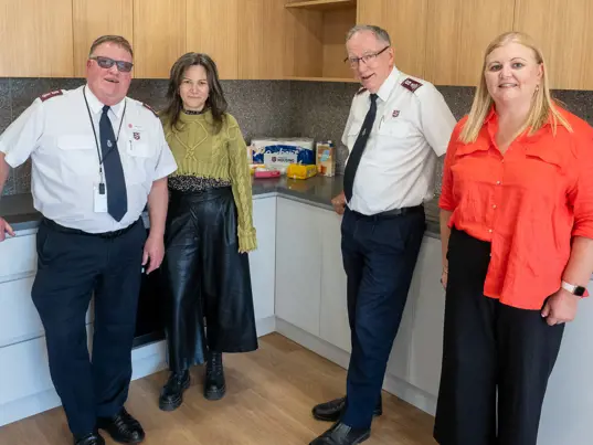 Salvos officers in the kitchen
