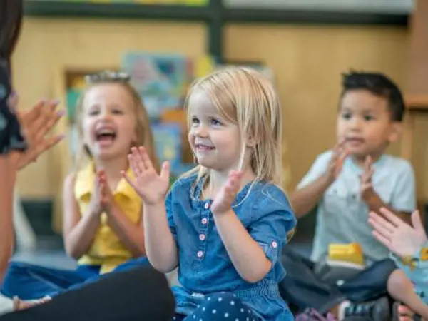 teacher talking to kids