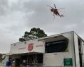 Salvation Army food truck with waterbombing helicopter in background